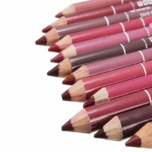Set of lip pencils in various shades on a white background