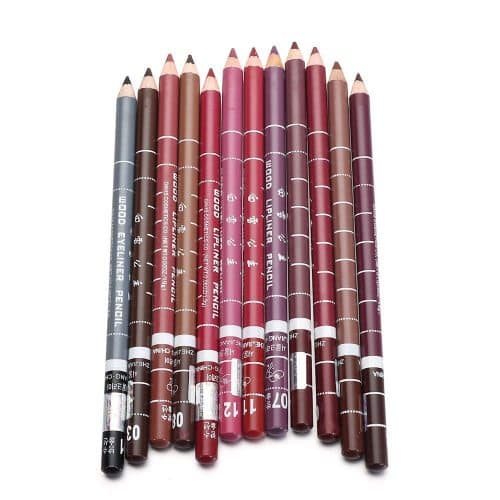 Set of lip liner pencils in various shades on a white background