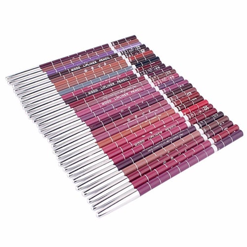 Set of lip liner pencils in various colors arranged on a white background